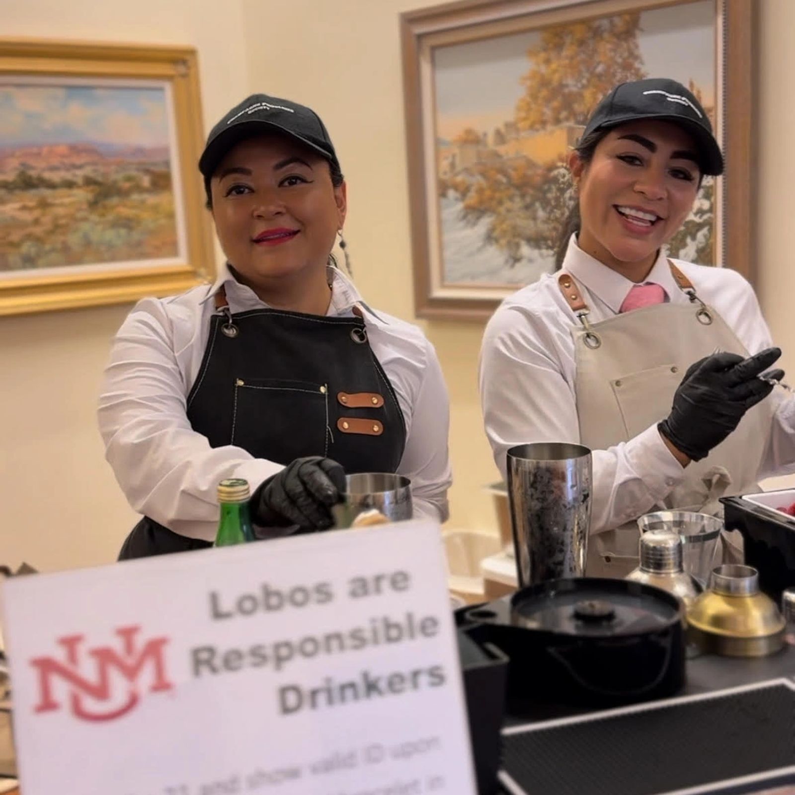 Two Champagne Problems bartenders serving at a University of New Mexico event